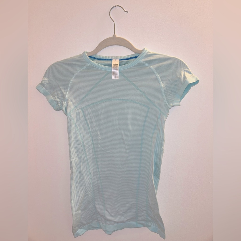 Ivviva short sleeve light blue athletic shirt size 12